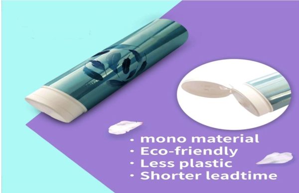 A mono-material eco-friendly squeeze tube with a flip-top cap, featuring a sleek blue design with leaf patterns, emphasizing sustainability and reduced plastic use.